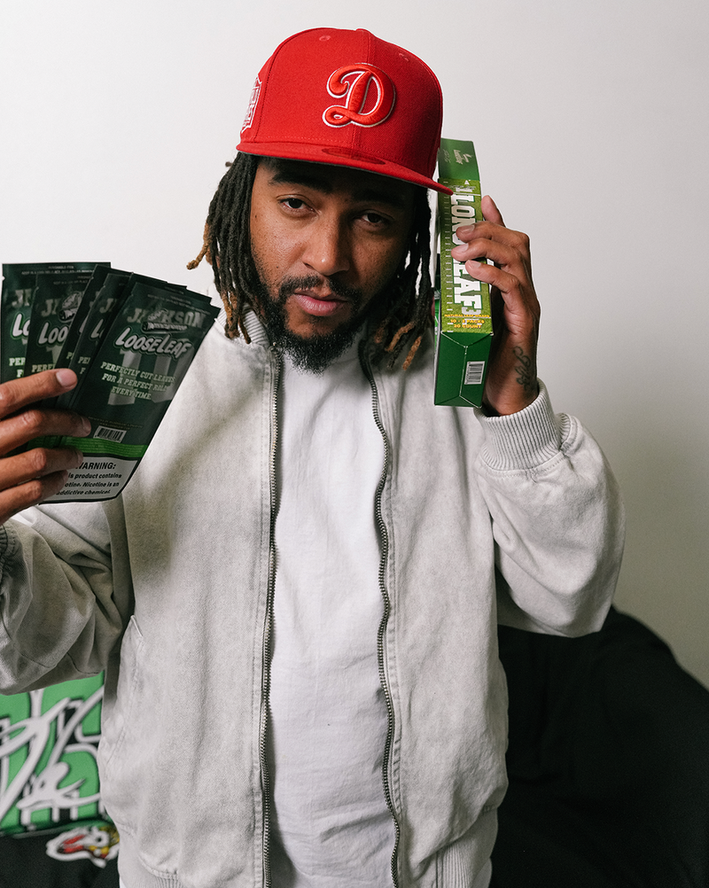 Desean Jackson holding Long Leaf Looseleaf packages 